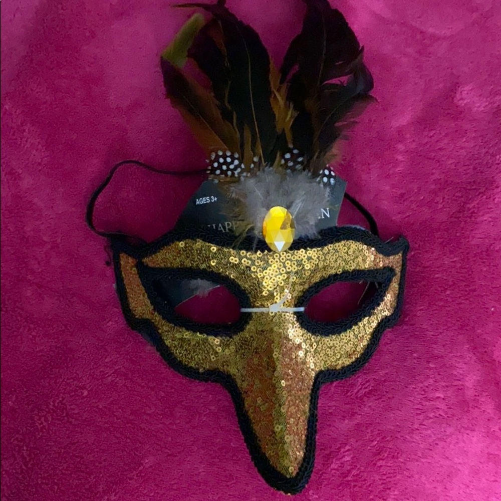 Gold Mardi Gras Mask with beautiful feathers